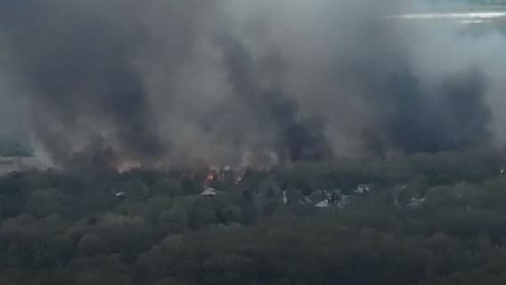 Massive brush fire in Island Lake is now contained, fire officials say