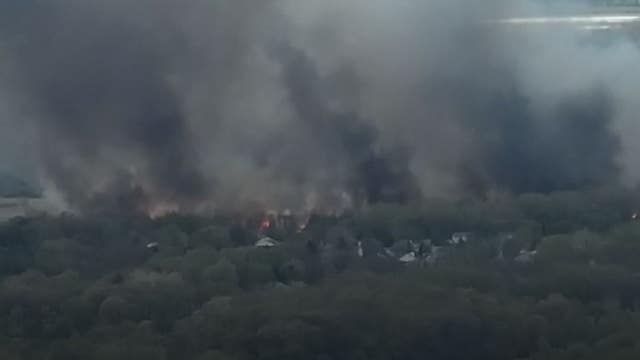 Massive brush fire in Island Lake is now contained, fire officials say