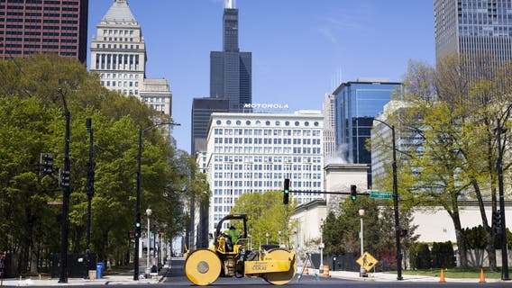 Downtown Chicago streets to close early for NASCAR race to repair pavement buckle