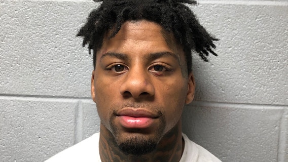 Chicago man arrested in armed robbery outside suburban home, police say