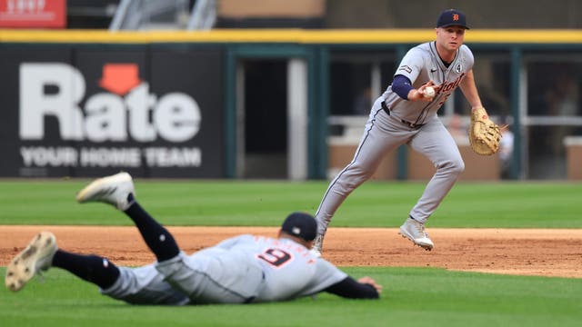 Carpenter hits 3 homers as the Tigers reach 40 wins by pounding the White Sox 13-1