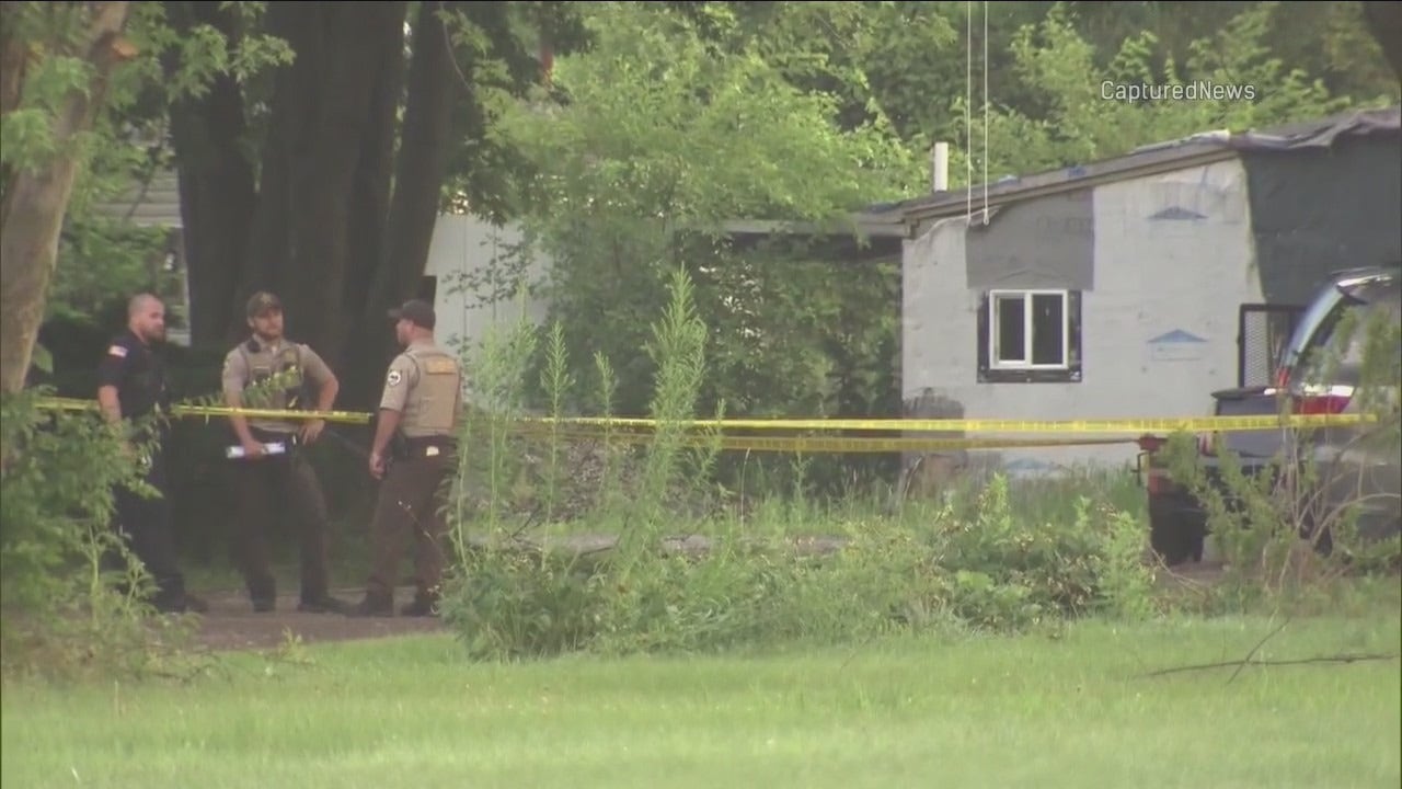 Two Dead, Manhunt After Sheridan Illinois Fire