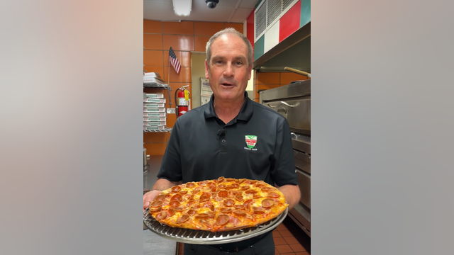 Aurelio's plates up the 'Poperoni Pizza' in honor of Pope Leo XIV