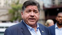 Pritzker signs bills targeting unfair home and auto insurance rates