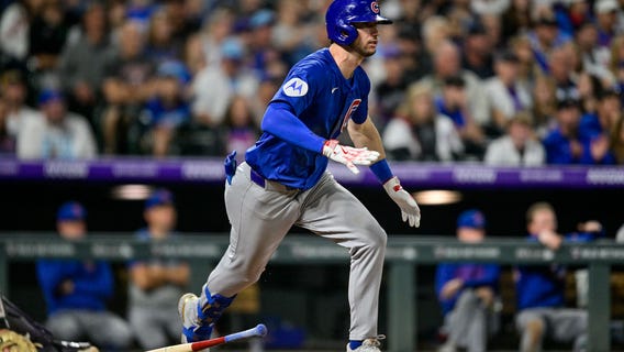 Tucker and Assad power Cubs to a 4-3 win over the Rockies