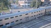 Commuter caught crawling under stopped Metra train in Chicago suburb, video shows