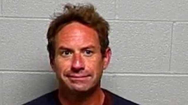 Man charged with setting fire to Chicago-area home