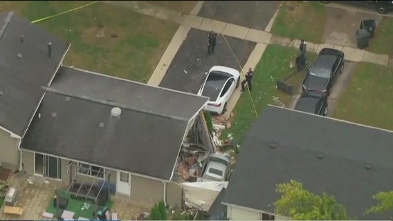 Two hospitalized after car crashes into Chicago-area home: officials