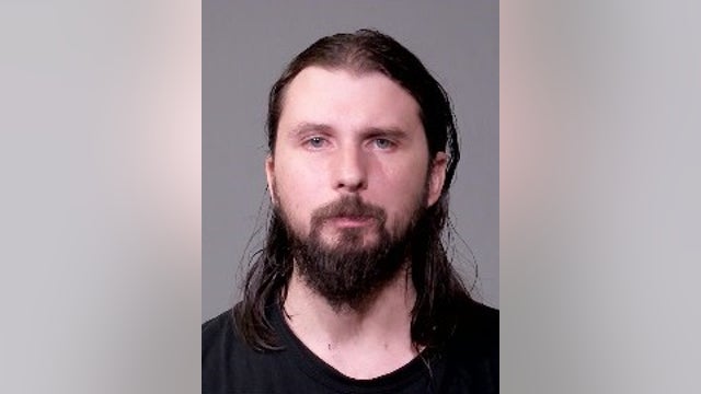 Joliet man charged after hitting, pinning a woman in Walmart parking lot