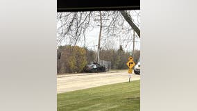 All lanes closed on I-94 after car hits light pole, brings down live wires: police