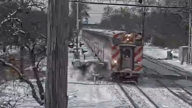 Metra train crashes into car in Hinsdale, injuring driver, police say