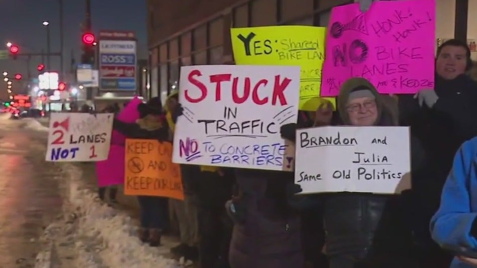 Heated protest erupts in Chicago over new concrete bike lanes on Archer Ave.