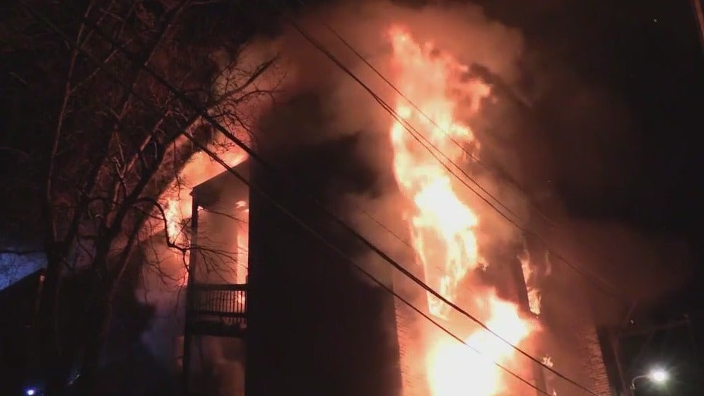 Fire at Uptown apartment building leaves woman, firefighter injured