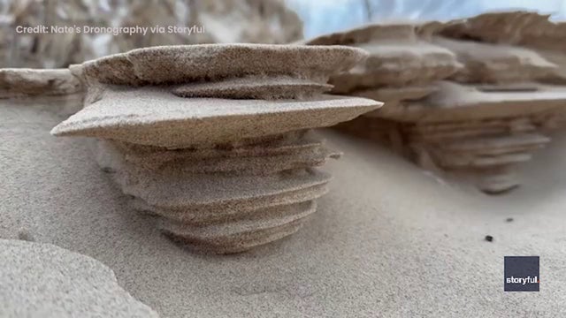 Wind, freeze team up to sculpt rare sand pillars along Lake Michigan