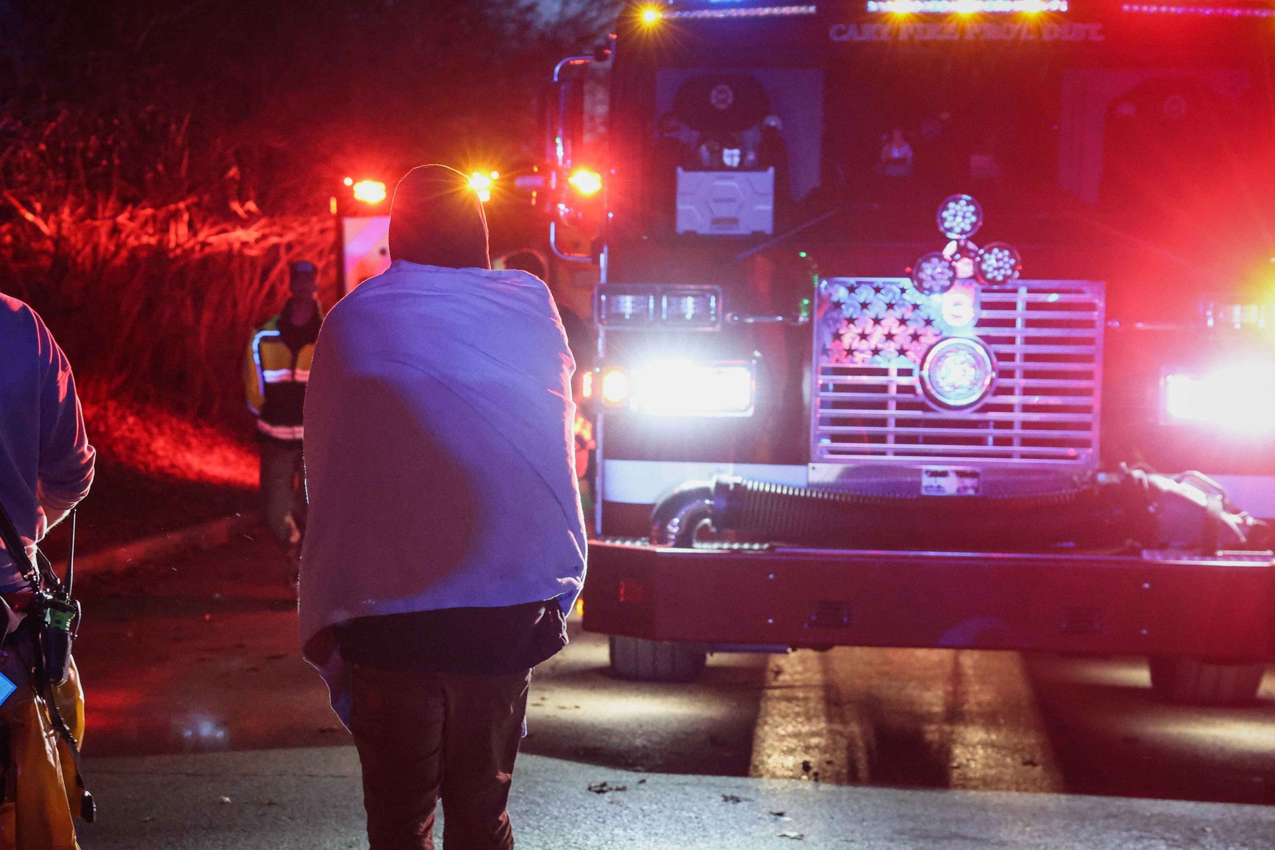 3 hospitalized after falling through ice while ice fishing at suburban lake, officials say