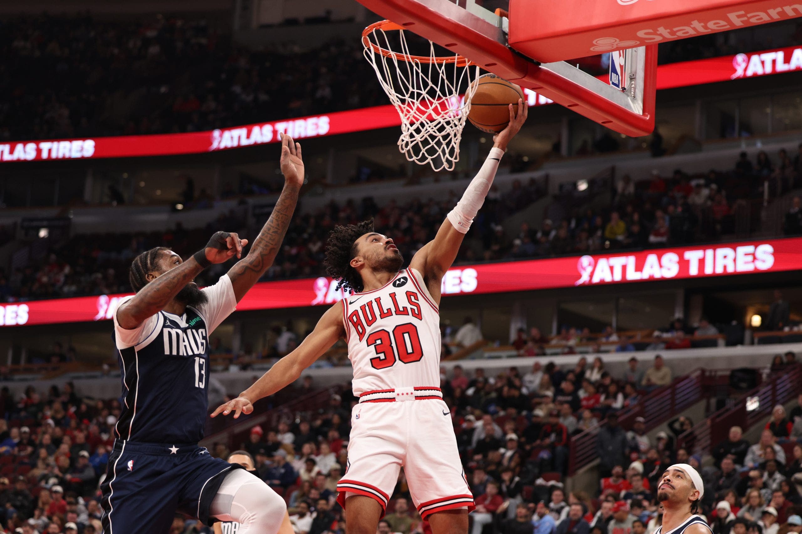 Bulls beat Mavericks 125-107 after Kidd is ejected in the first quarter