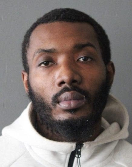 Man charged with murder in Chicago parking lot shooting