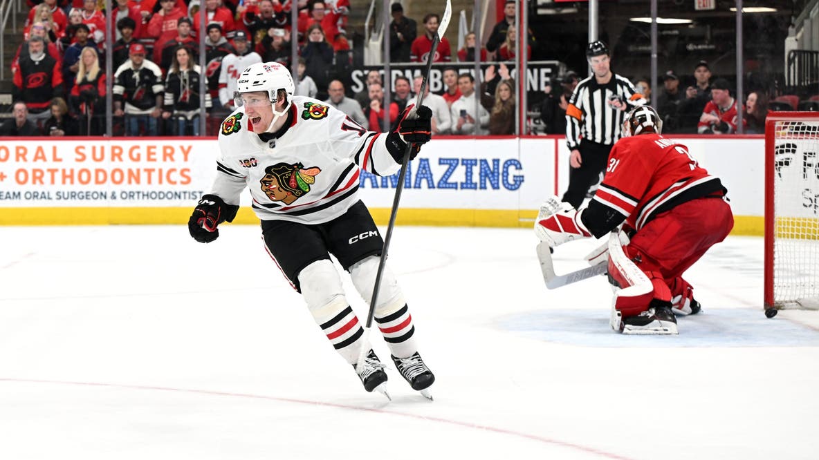 Oliver Moore scores in shootout on 21st birthday, leads Blackhawks to 4-3 win over Hurricanes
