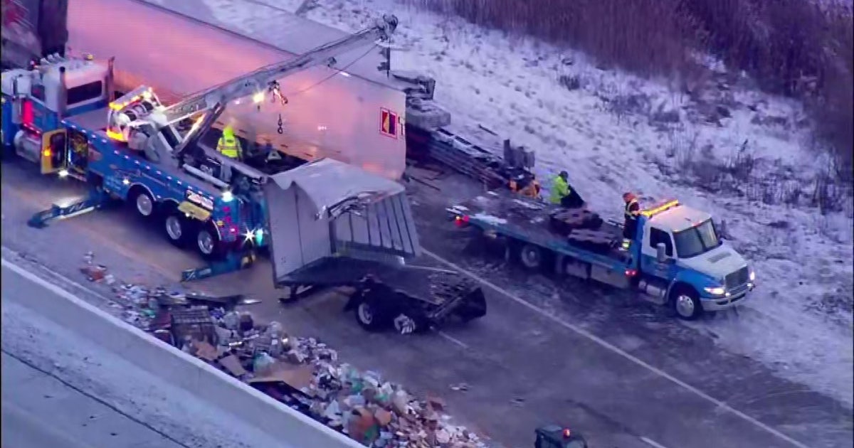 Semi crash on I-65 exit ramp spills mail across roadway in NW Indiana