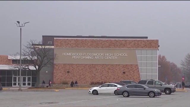 One person in custody after gun found at suburban Chicago high school: officials