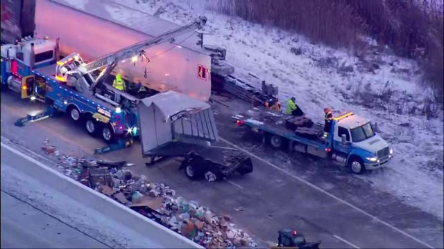 Semi crash on I-65 exit ramp spills mail across roadway in NW Indiana