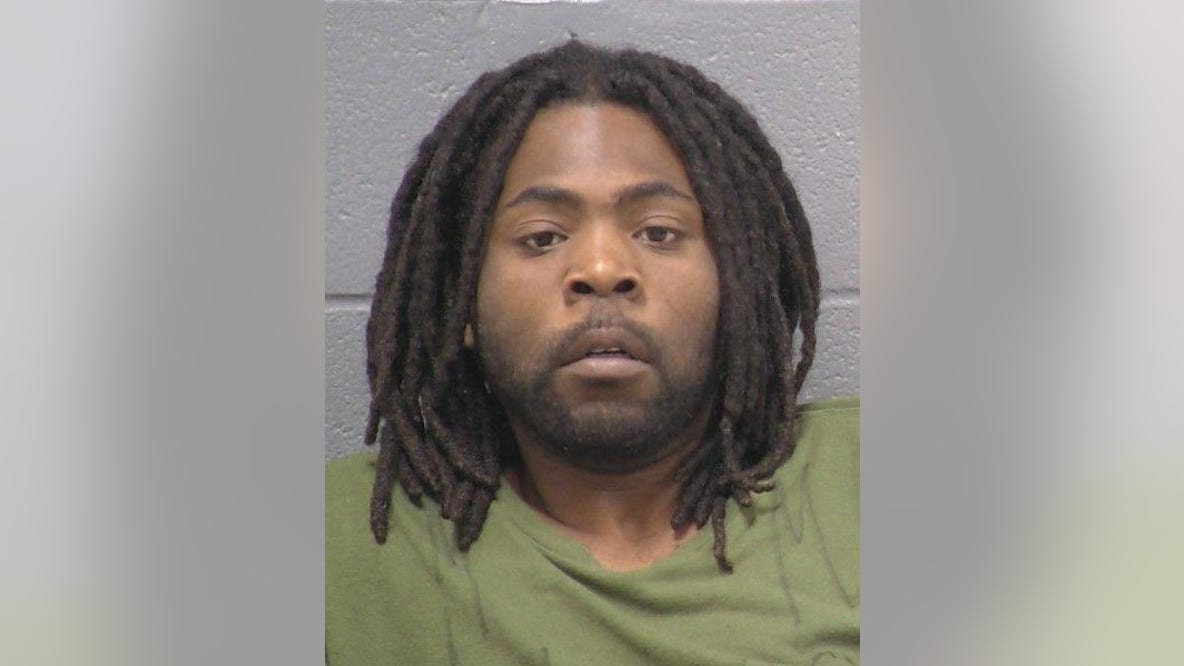 Chicago man charged after being found with loaded, stolen gun in Joliet