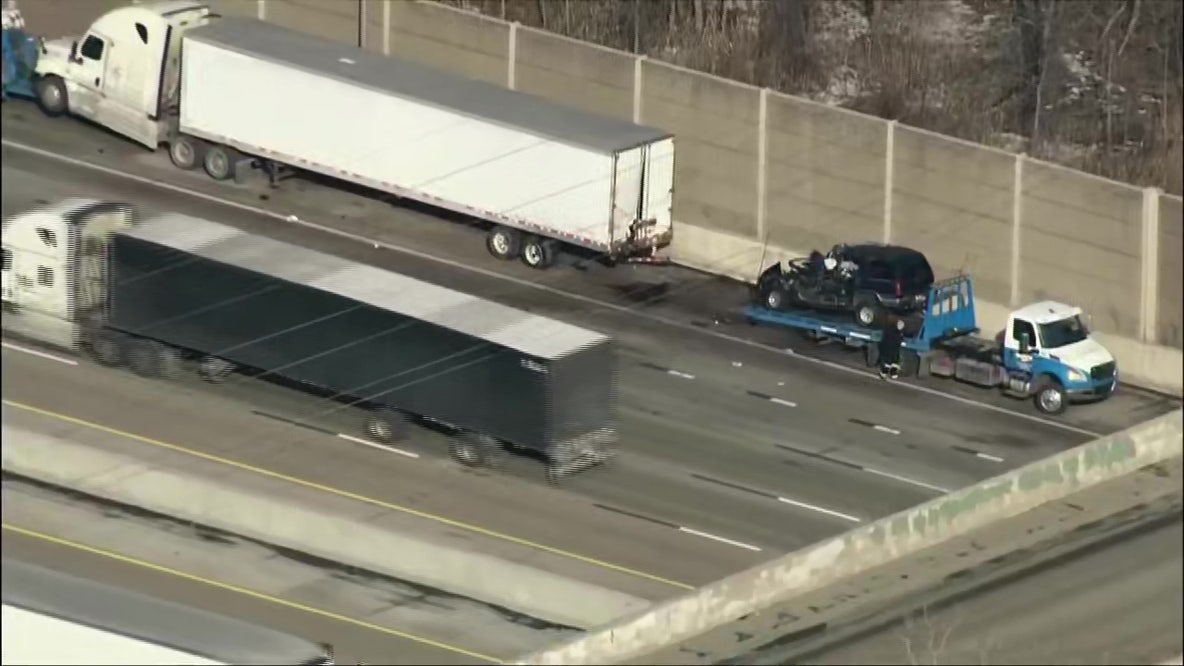 Vehicle slams into disabled semi on I-80/94, driver flown to Chicago hospital