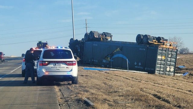 I-65 ramp in Indiana closed after truck overturns, leaks gas, police say