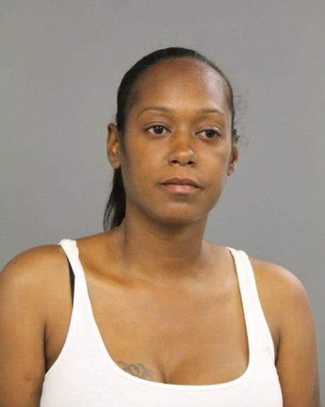 Suburban woman arrested 2 hours after shooting someone she knew in Chicago, police say