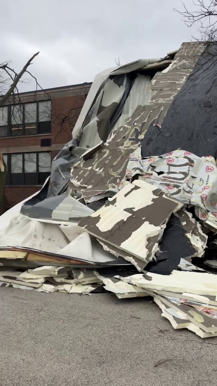 Strong winds tear roof off suburban Chicago high school, classes canceled