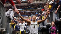 Michigan's Nimari Burnett playing in his Chicago hometown for a spot in the Final Four