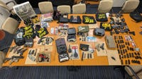 Two charged after feds seize 11 guns, 20 machine gun devices in Chicago Lawn: officials