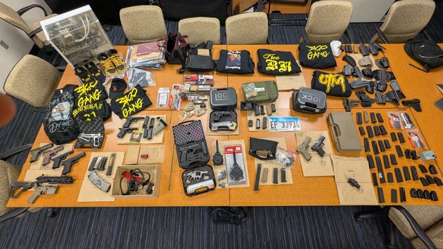 Two charged after feds seize 11 guns, 20 machine gun devices in Chicago Lawn: officials