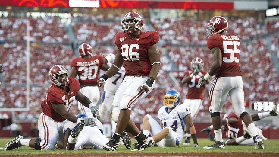 Prosecutors say makeup, wigs helped former Alabama tackle impersonate NFL players in $20M fraud