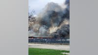 Massive fire erupts at pallet company in Maywood