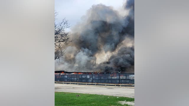 Massive fire erupts at pallet company in Maywood