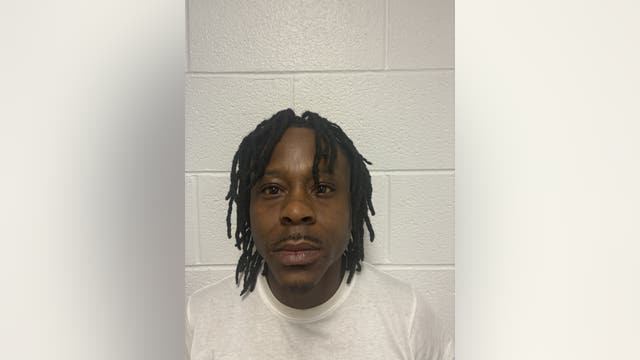 Man charged after $100K heist in Chicago suburb, police search for others