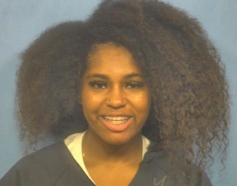 Suburban Chicago woman accused of high-speed chase, biting officer held in custody