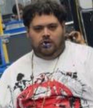 Chicago police search for man accused of spitting liquid on CTA rider