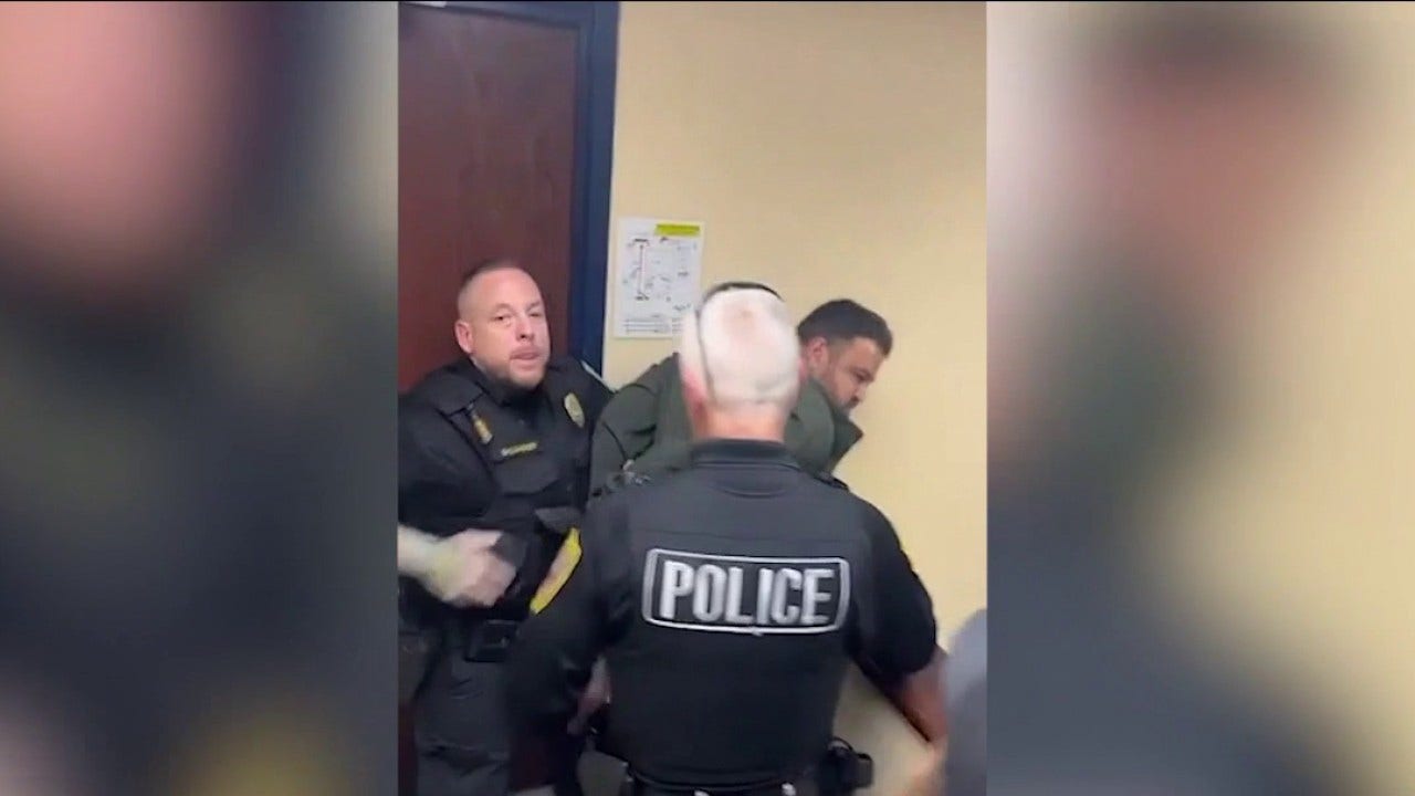 Video shows man removed, arrested at Indiana data center meeting