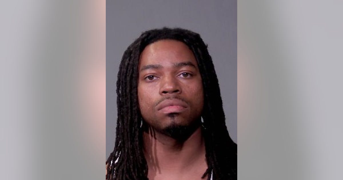 Man charged after police recover drugs, stolen gun in Joliet raid