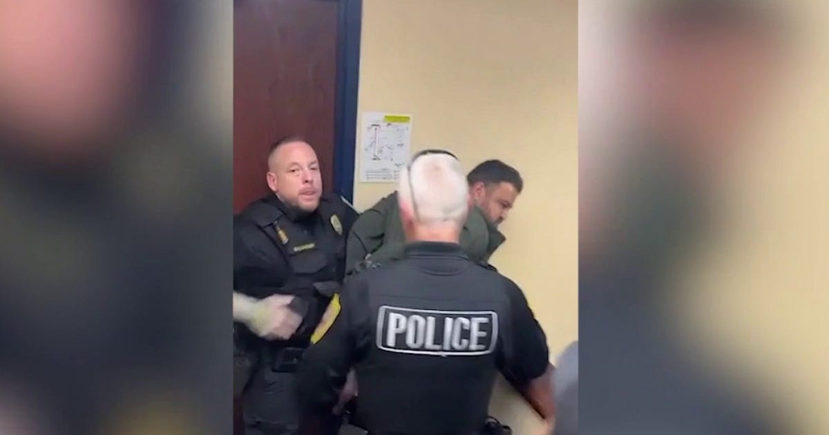 Video shows man removed, arrested at Indiana data center meeting