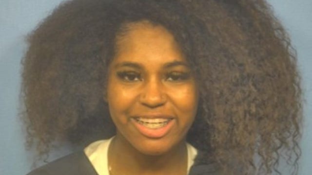 Suburban Chicago woman accused of high-speed chase, biting officer held in custody