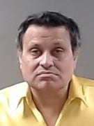 South Elgin man injured officer, threatened to shoot during standoff, police say