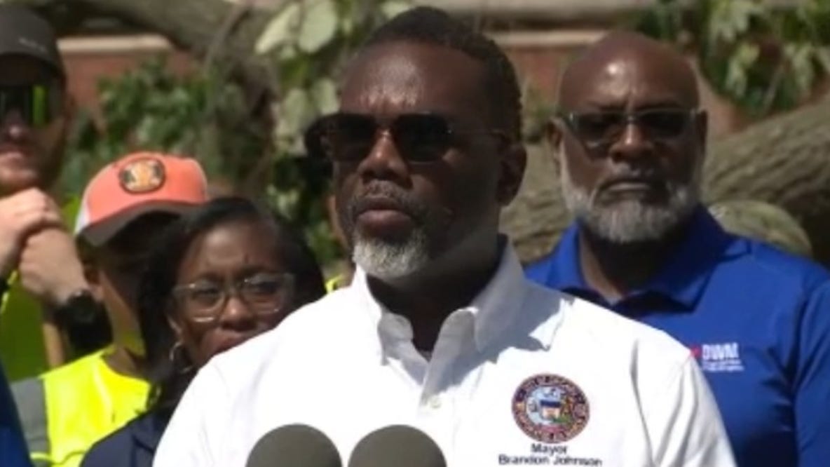 Mayor Brandon Johnson surveys storm damage as thousands remain without power