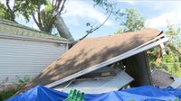 Residents assess damage as power restoration continues in Merrillville