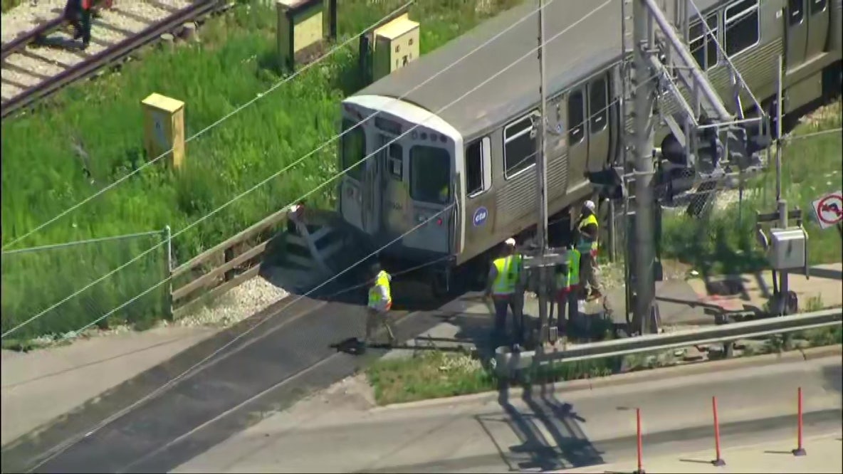 CTA Yellow Line train strikes vehicle, suspends service