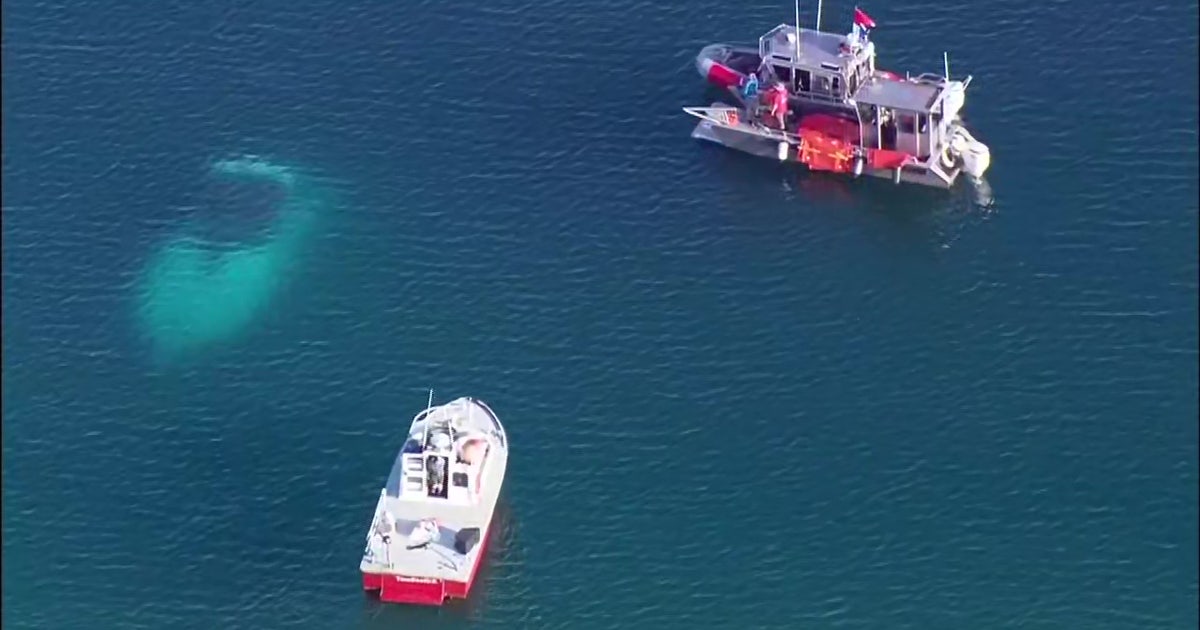 Crews investigate sunken boat spotted in Lake Michigan