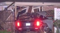 Driver sought after crashing into suburban Chicago home in hit-and-run