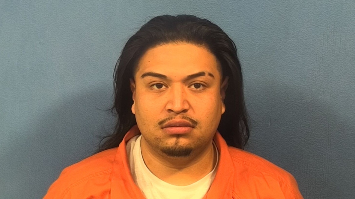 Gang member fired shots at vehicle in Chicago suburb, prosecutors say